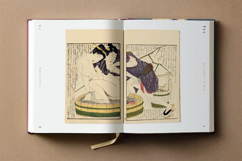 Open Hokusai Shunga art book showing erotic bathing scene woodblock print